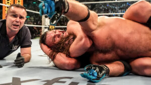 “غروب شمس الاستثنائي: غونتر يغتال مسيرة ‘AJ Styles’ في ليلة الدموع بالرياض.. والبورصة تعلن إفلاس الأساطير!” 😭💔